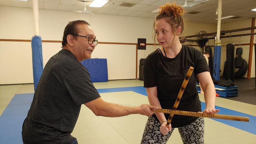 Jemar Carcellar training a lady