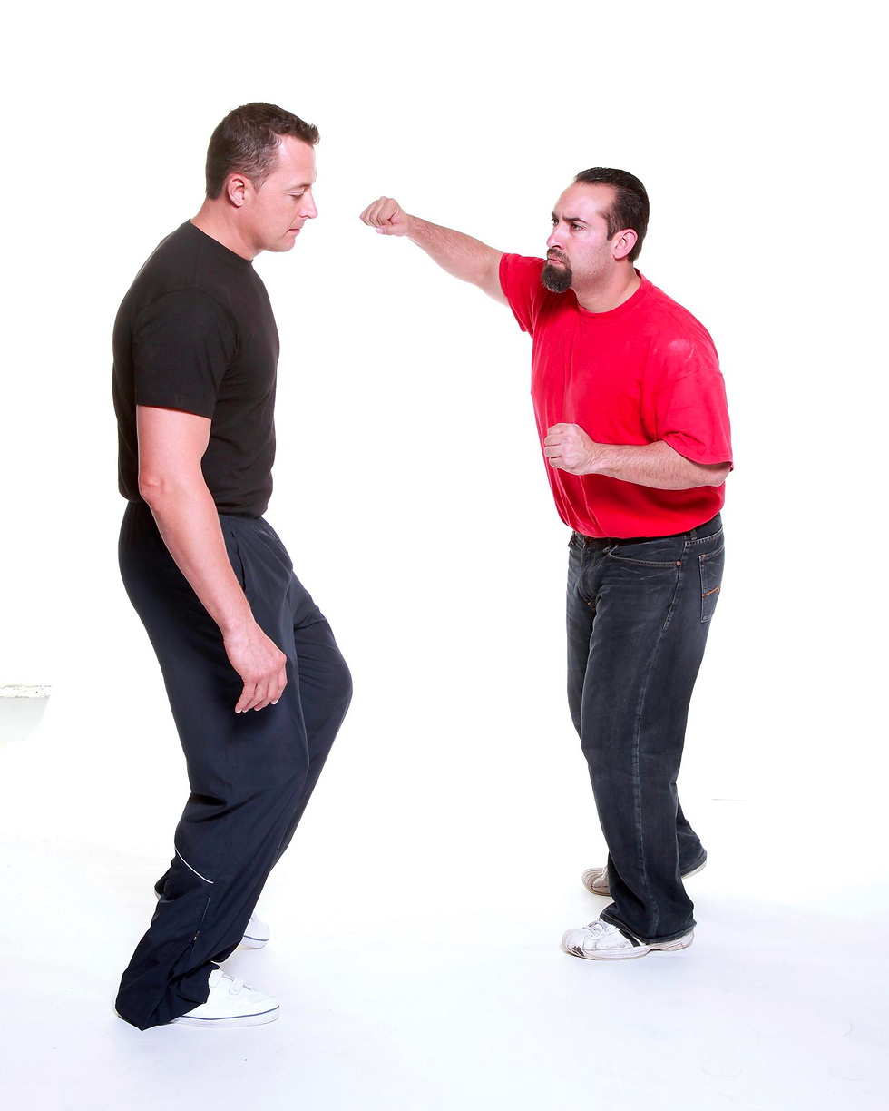 As soon as the man initiates his punch...