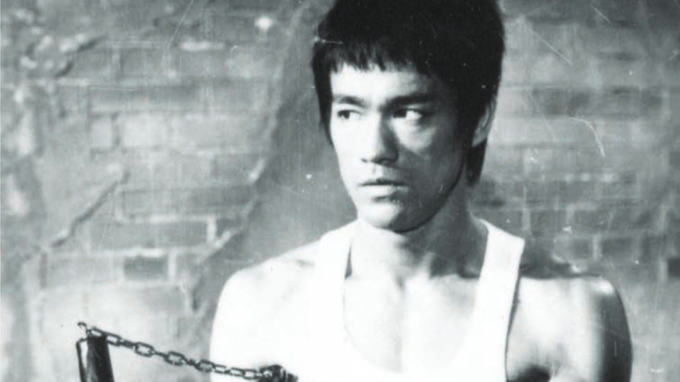 Bruce Lee with a Nunchaku