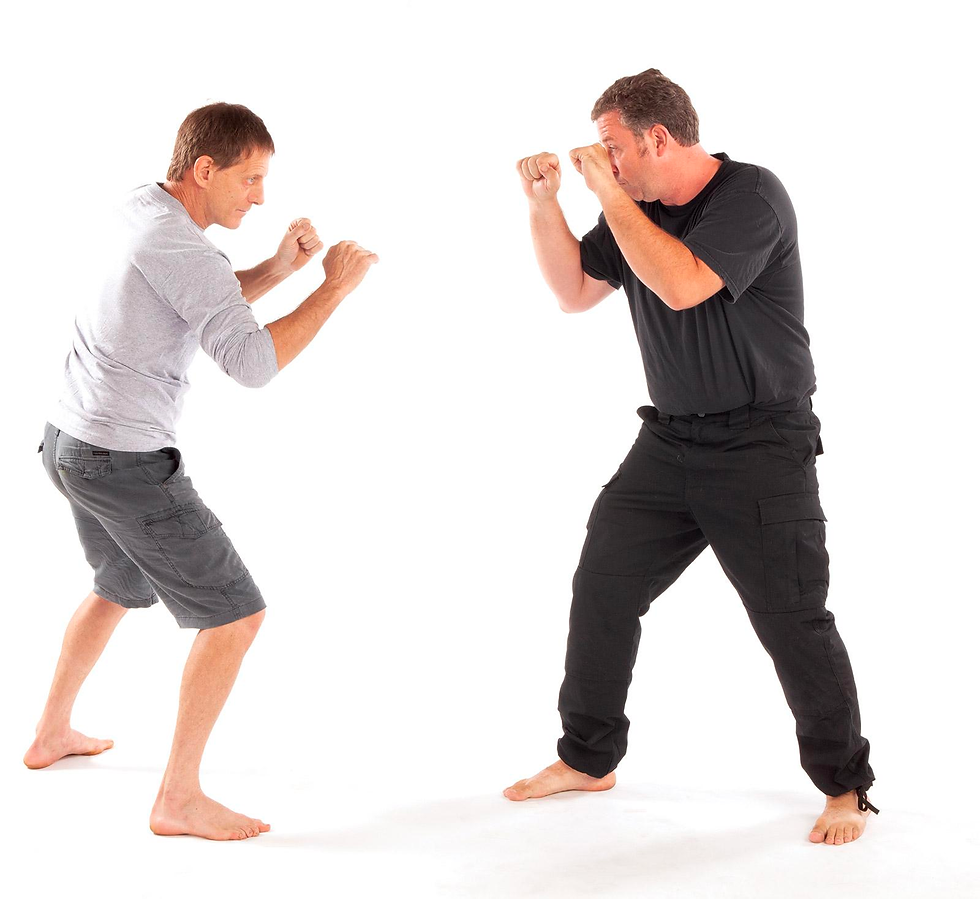 Paul Vunak (left) faces off against his opponent.