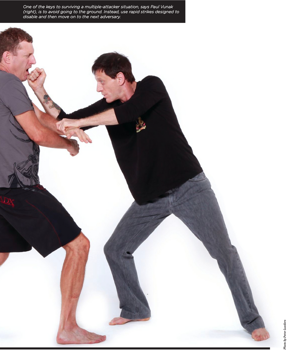 Paul Vunak traps his opponent's arm and counter punches