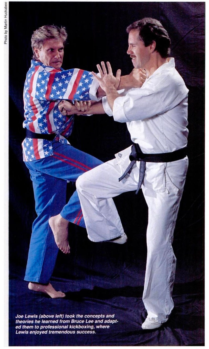 Two men practicing martial arts. One wears a USA flag outfit, the other in white with a black belt. Dark background, focused expressions.