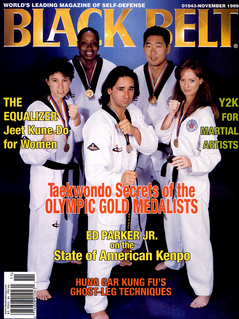 Martial arts magazine cover with four taekwondo athletes in white uniforms and medals, fists raised, BLACK BELT, November 1999.