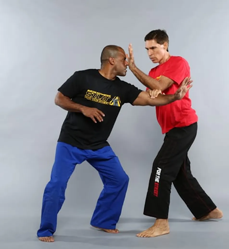 hand striking burt richardson