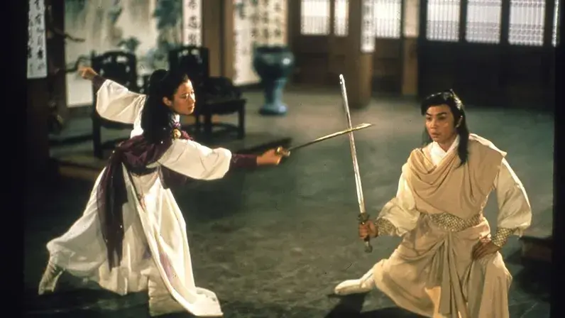 Two straight swords clash
