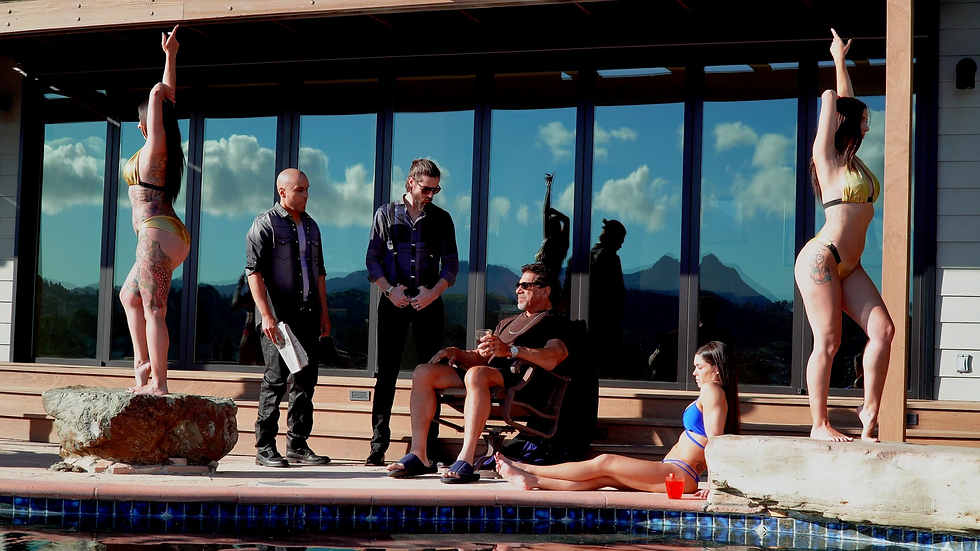 3 women in bikinis and 3 guys dressed for business